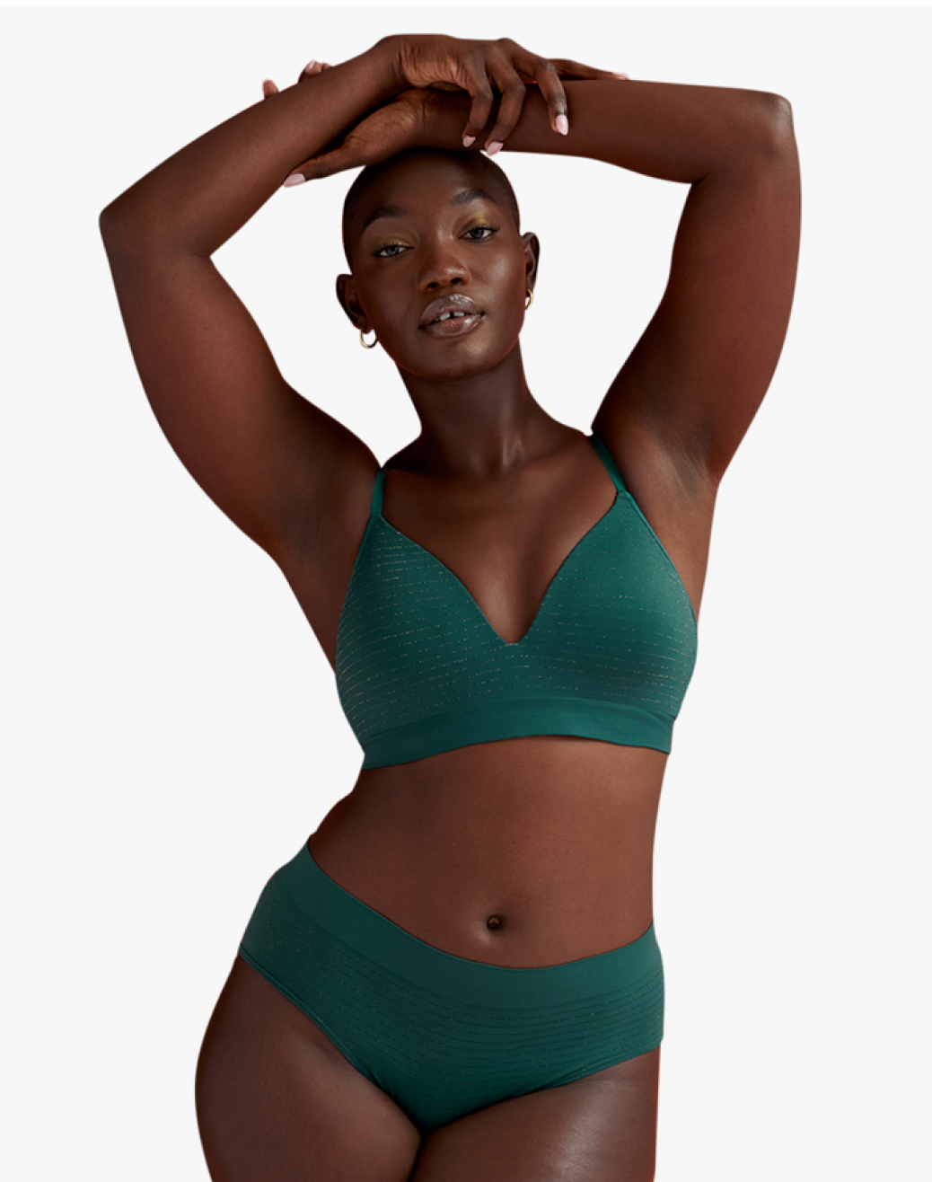 plus size woman in teal green bra and panty set